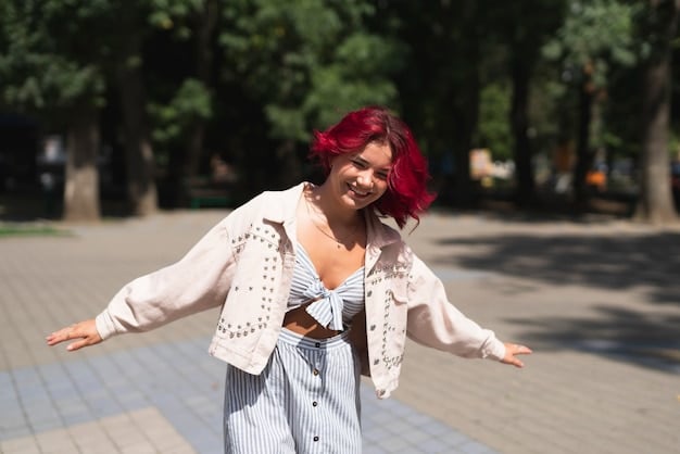A street style photo featuring a person wearing a blouse with statement sleeves in a bold floral print, paired with neutral-colored pants. The setting is a vibrant city street, emphasizing the outfit's statement.