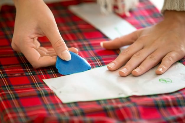 A person's hands carefully examining the stitching and fabric quality of a Shein kids' shirt, focusing on the seams, buttons, and overall construction to ensure durability.