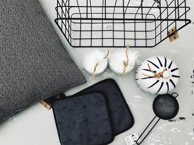 A close-up shot of various Shein home decor items, including a patterned cushion cover, a small decorative vase, and a string of fairy lights, showcasing the aesthetic appeal and affordability of the products.