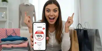 Woman excited about Shein 15% off code on smartphone