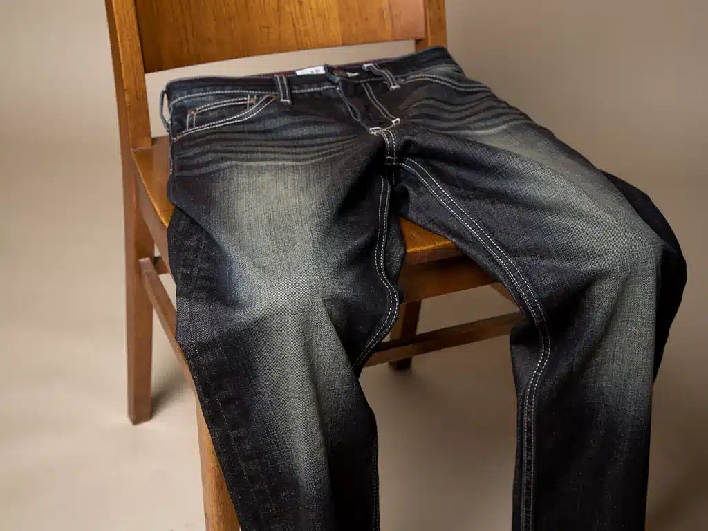Dark wash straight leg jeans, showcasing vintage denim wash.